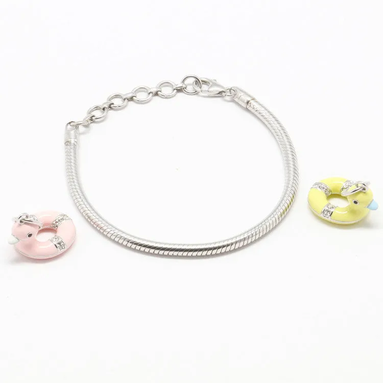 Charm Bracelet in 925 Sterling Silver <br> <span style="font-size: 11px; font-family:Helvetica,Arial,sans-serif;">Pink/Yellow Enamel Duck Charm </span>