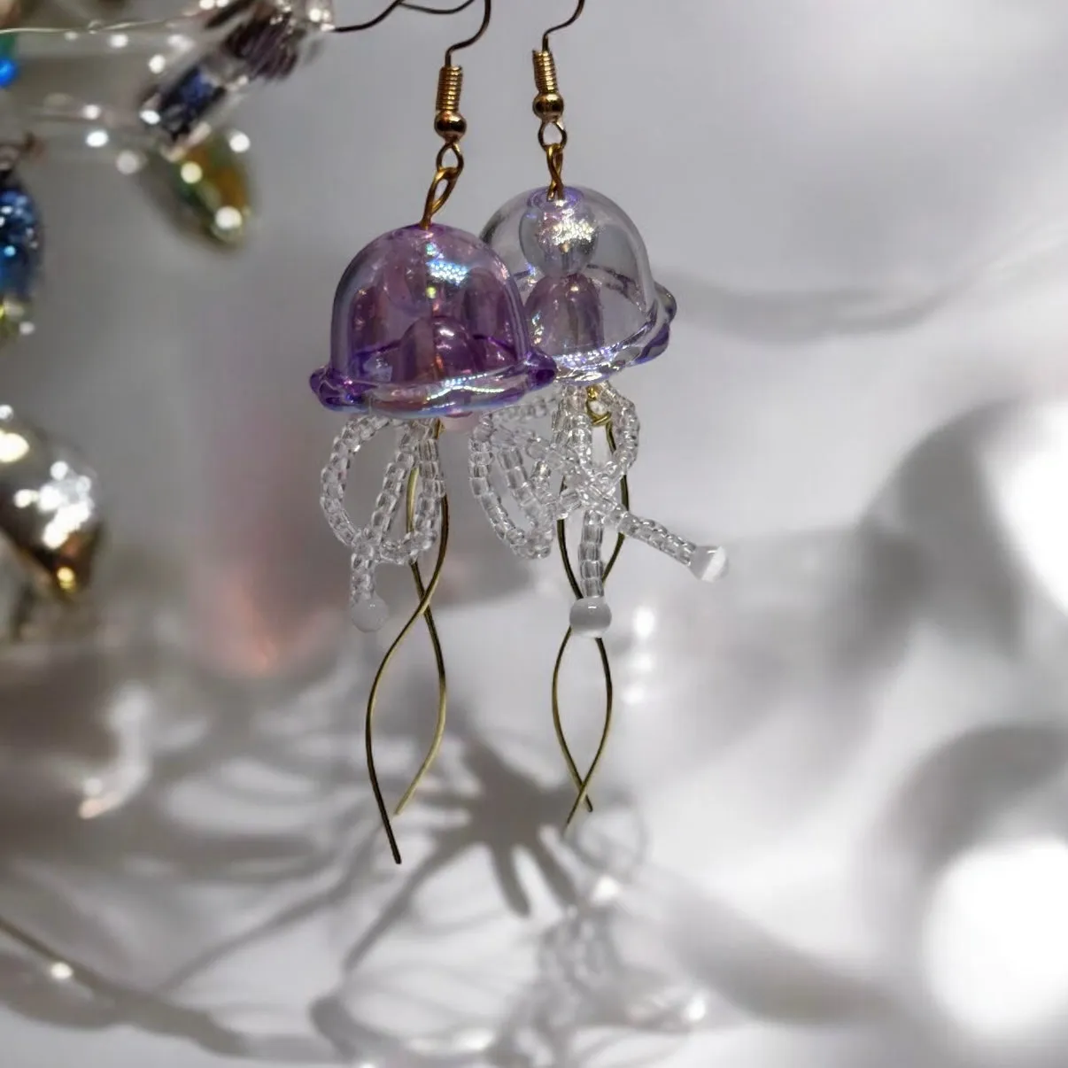 Whimsical - Colourful purple Jellyfish earrings | sea creature zoology earrings | colourful clear iridescent dangle oversize earrings | halgoram fun y2k earrings